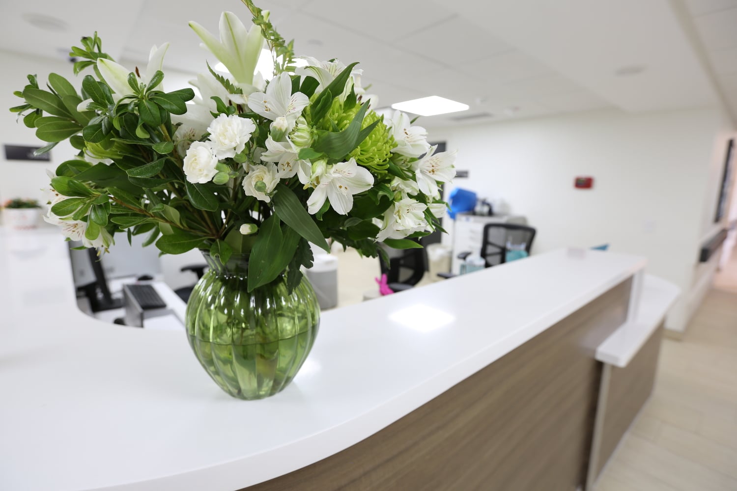 desk with fresh flowers at Haven Health Sierra Vista