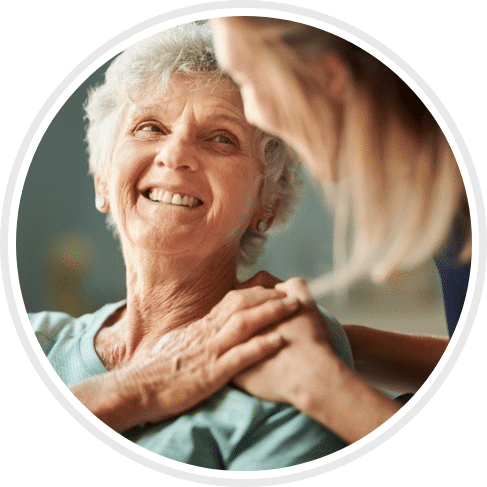 Nurse helping patient which makes them smile