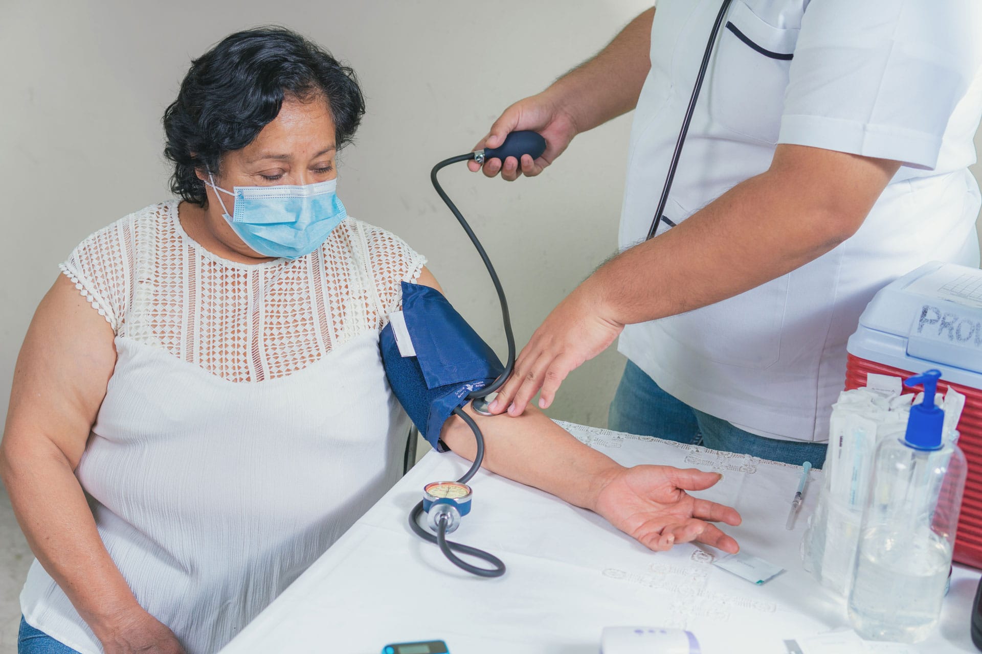 Skilled nursing professional taking patient vitals