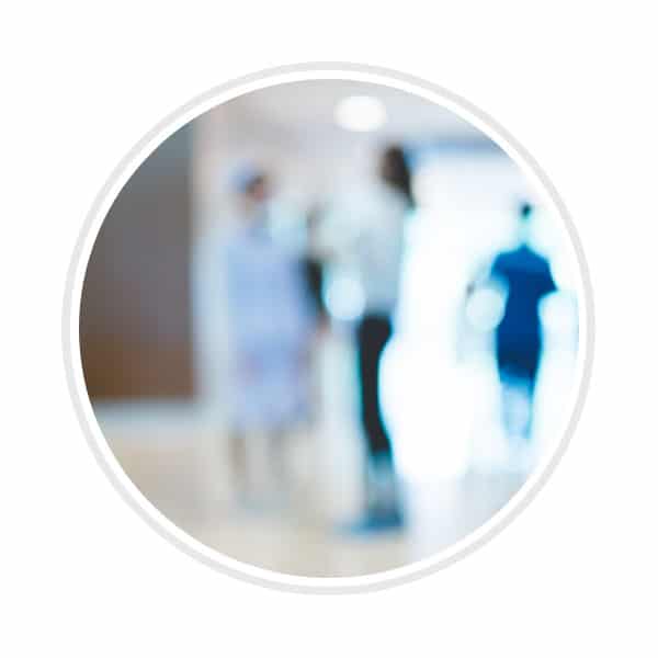 blurred image of nurses working in assisted living facility
