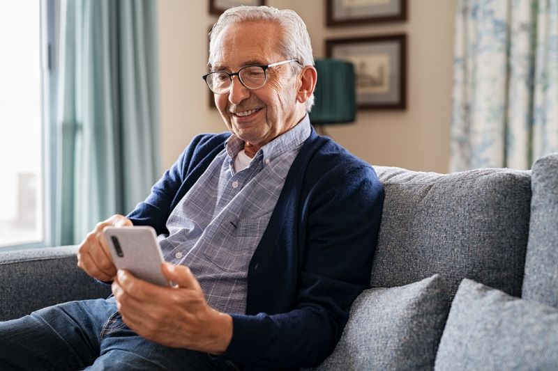 senior man relaxing after receiving infusion therapy earlier that week