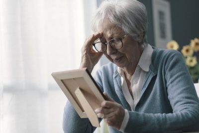 Woman grieving the loss of her husband