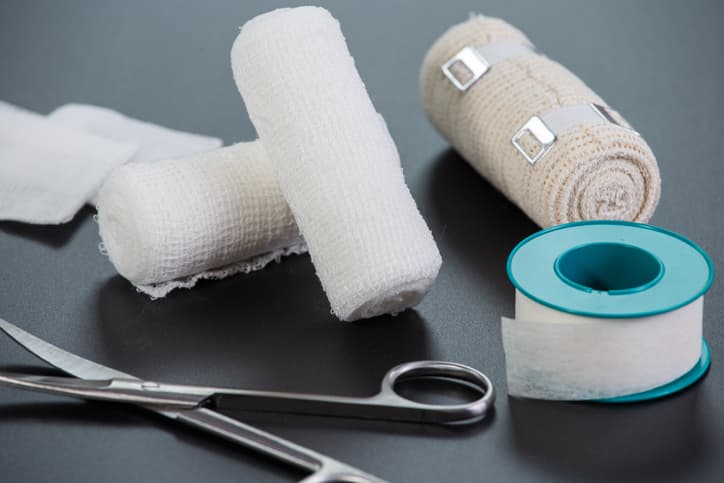 Medical bandages with scissors