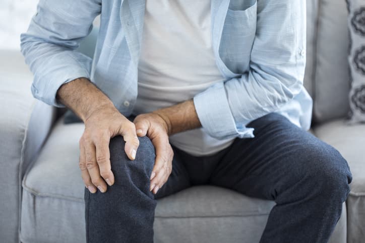 Man With Joint Pain In His Knee