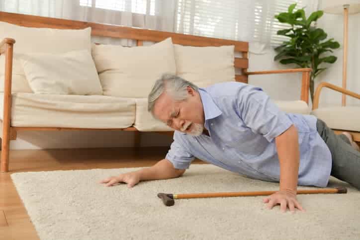 Elderly Man Who Has Fallen Down In His Living Room