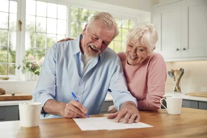 older couple looking at documents together