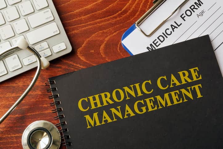 A notebook that reads: "Chronic Care Management."