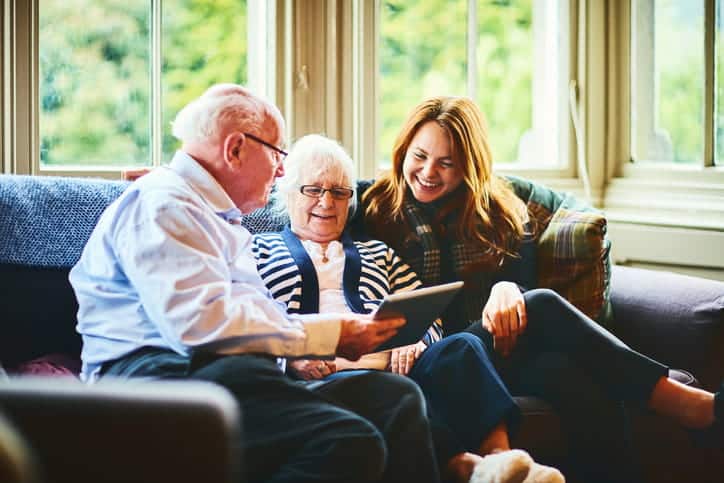 A Family Visiting Their Loved One At An Assisted Living Facility.