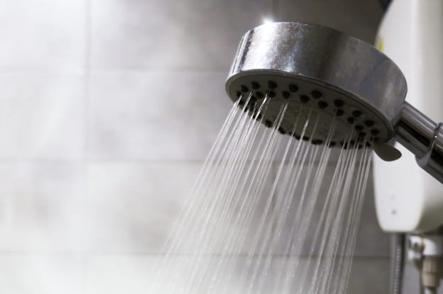 A Shower Head Spraying Water.